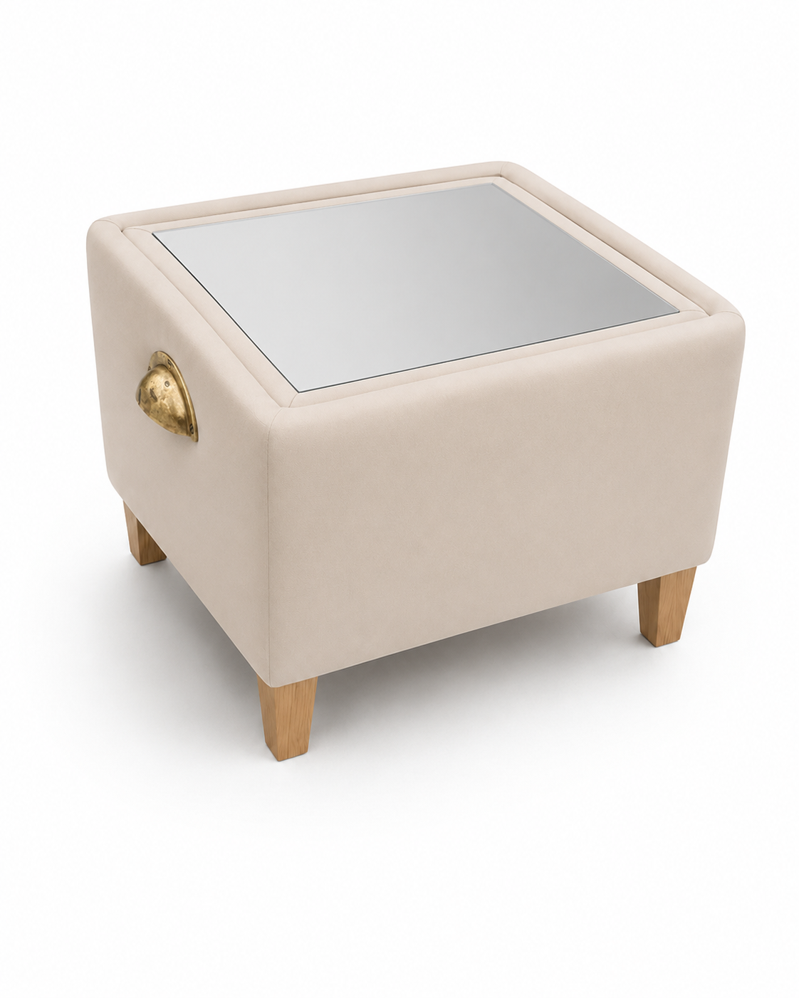 A Pappa Pouffe flipped to its mirrored tabletop side with brass handle